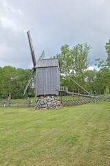 Historic wooden post mill (pukktuulik) located at Angla Windmill Park located on Saaremaa Island in Estonia, Europe. © Raimo Bergroth