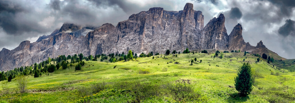 mountain panorama of Val Gardena in Dolomites  mountain in Italy , south tyrol, beautiful rocky peaks under cloudy  sky, dramatic scene