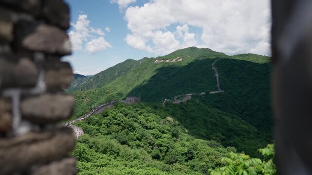 View from watchtowers on landscape in Yin Mountains with Great Wall of China. Border controls in Silk Road and protection against various nomadic groups from Eurasian Steppe, explore Asia region