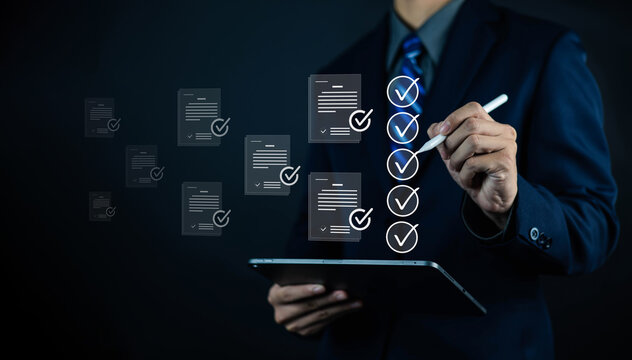 Business professional reviewing digital documents with checklist on tablet, illustrating document verification, compliance audit, quality assurance, workflow management, paperless approval.