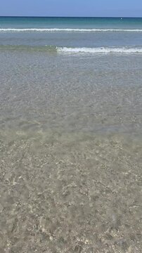 waves on the beach, vertical background