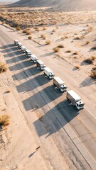 Fototapeta premium Convoy of Delivery Trucks Traveling Through Arid Desert Landscape at Sunset