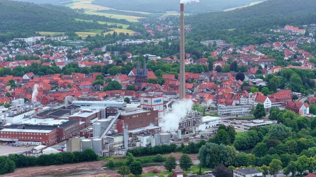 Alfeld, Lower Saxony, Germany - June 30, 2026: Aerial Video of Sappi Paper Mill and Alfeld, Germany