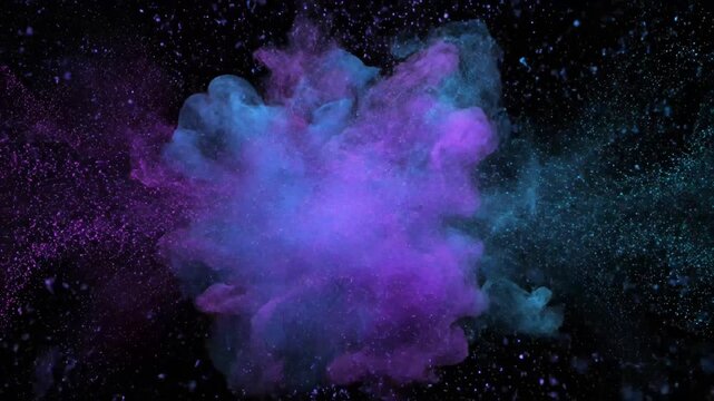 Purple and blue powder explosion isolated on black background