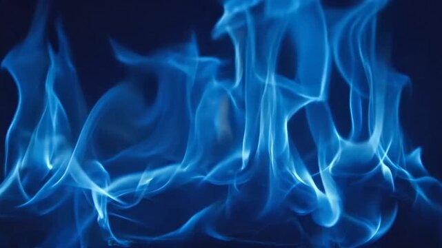 Vibrant blue flames dance against a dark and moody background