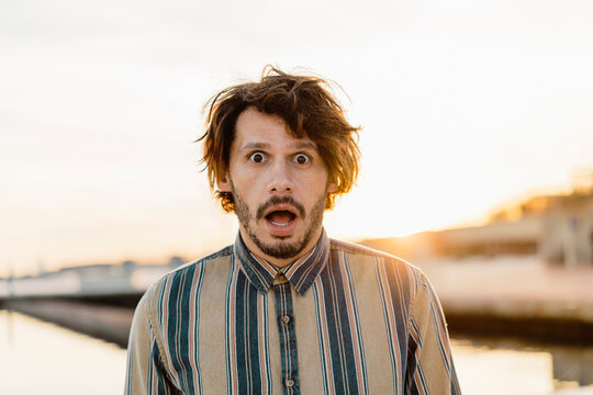 Portrait of staring man at sunset