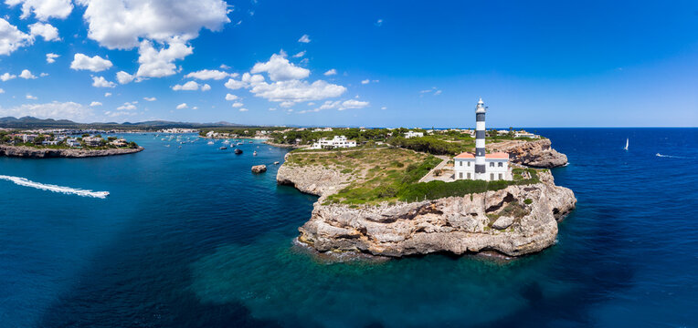 Spain, Baleares, Mallorca, Portocolom, Punta de ses Crestes, Bay of Portocolom and Cala Parbacana, Lighthouse