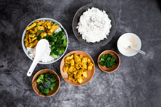 Rice with chicken curry and broccoli