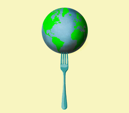 Illustration of planet Earth on oversized fork