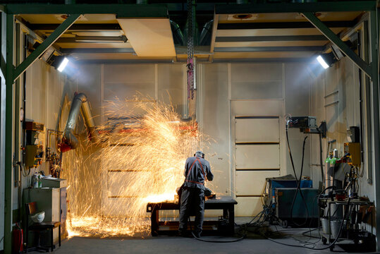 Welder working in a factory