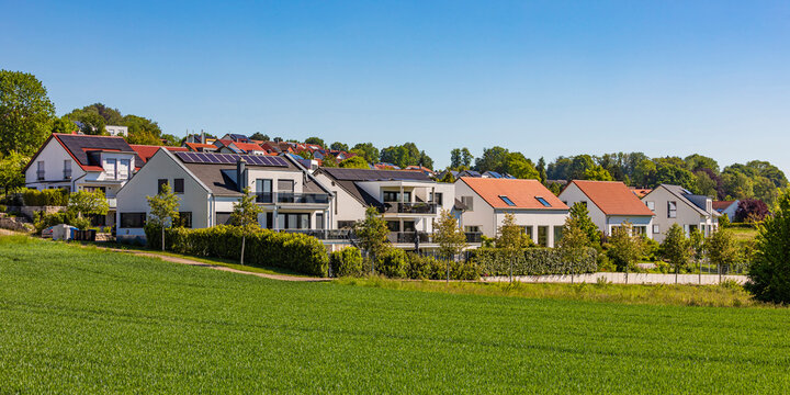 Modern energy-efficient houses with solar panels in Ulm Germany