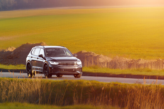 Modern luxury SUV on quiet rural road