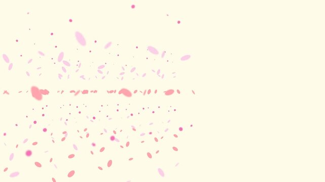 Pink oval particles float in a rhythmic motion pattern creating a soft digital animation effect for modern creative video projects