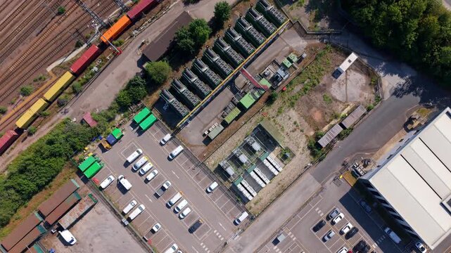 Aerial view of industrial compressor units and backup electrical generation turbines