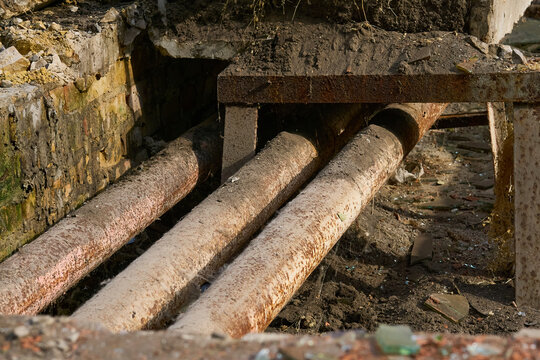 Breakthrough,old sewer pipe.Old rusty sewer tube in need of replacement