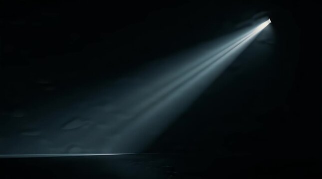 Spotlight Shining on Dark Water Creating Dramatic Effect