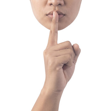 Man making silence hush sign with index finger on lips