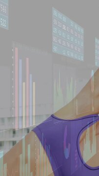 Vertical video: Purple woman stretching and rotating, showing fitness charts, pink giving thumbs-up