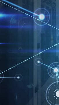 Vertical video: Diagonal streak sweeping, HUD nodes appearing and linking racks, showing data flow