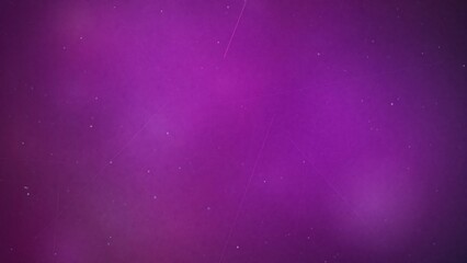 Abstract purple background with subtle light streaks and dust particles © MST BEAUTY