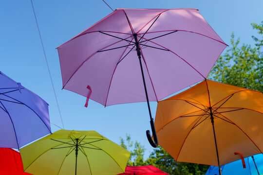 Vibrant display of colorful hanging umbrellas