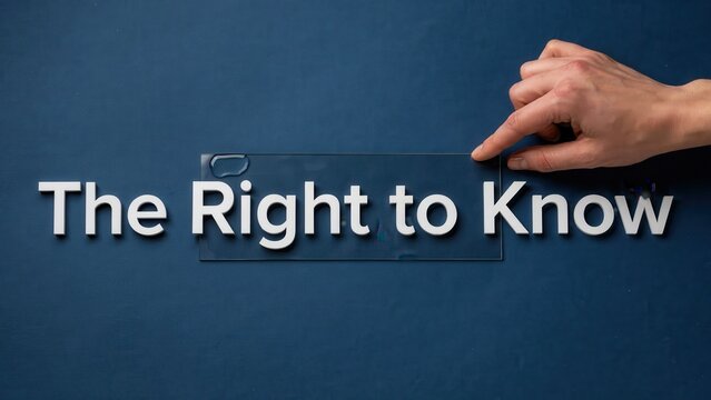 Conceptual image of hand holding glass over The Right to Know text representing transparency and freedom of information