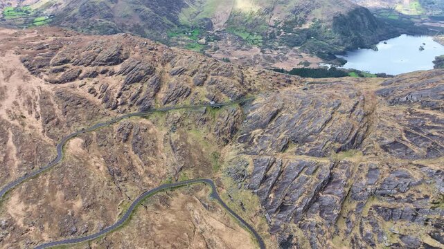 winding climb to the summit of The Healey Pass from County Cork Side Atlantic Way Drives in Summer