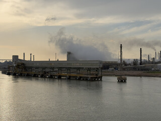 Fototapeta premium industrial plant. smock and buildings. berth of sea port.