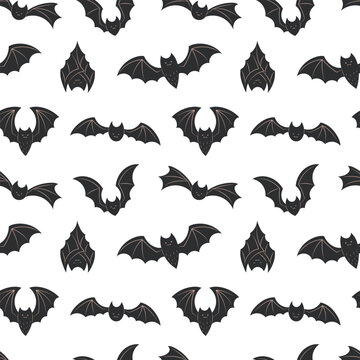 Halloween seamless pattern with black flying bat characters in various wing poses on white background. Cartoon vampire bat repeat texture with spread and folded wings. Flat vector illustration