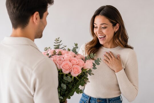 Happy Young Woman Receiving Beautiful Pink Rose Bouquet from Romantic Partner