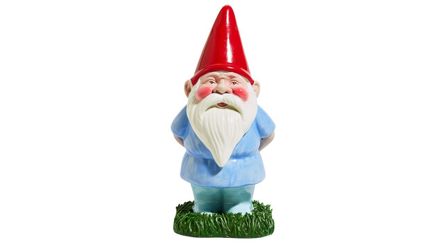 Garden gnome with red hat and blue tunic standing on grass