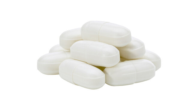 Pile of white oval pills with dividing line
