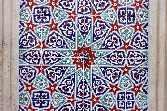 An example of Turkish tile art decorated with geometric and floral motifs. Tiles produced using traditional methods are used for wall decoration.