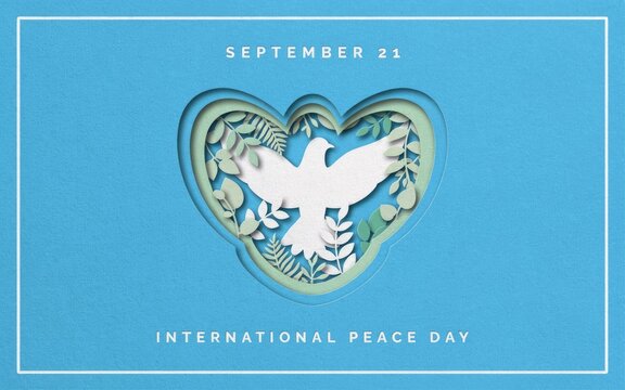 International peace day september 21st paper art dove heart symbolizing global harmony