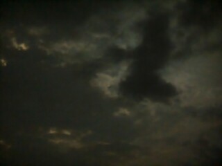 Obraz premium Close-up of Dark, Moody Clouds in a Stormy Sky stock