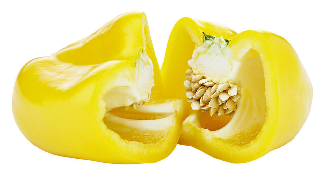 Yellow bell pepper cut in half showing seeds and flesh