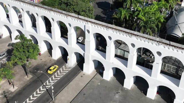 Aqueduct Arch in Lapa, Rio de Janeiro, Brazil. Arcos da Lapa in aerial view, establishing shot.