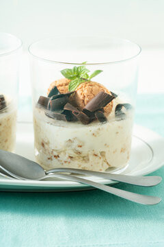 Italian Semifreddo Dessert in a Glass with Mascarpone, Whipped Cream, Sweetened Condensed Milk, Amaretti Cookies and Chocolate, Macro