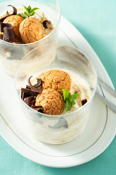 Italian Semifreddo Dessert in a Glass with Mascarpone, Whipped Cream, Sweetened Condensed Milk, Amaretti Cookies and Chocolate, Macro