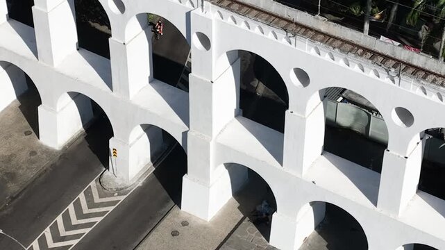 Aqueduct Arch in Lapa, Rio de Janeiro, Brazil. Arcos da Lapa in aerial view, establishing shot.