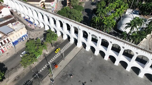 Aqueduct Arch in Lapa, Rio de Janeiro, Brazil. Arcos da Lapa in aerial view, establishing shot.