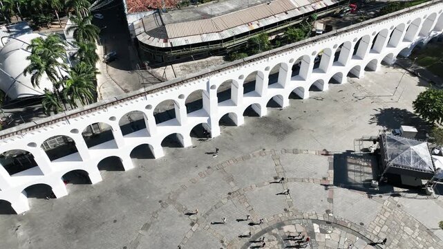 Aqueduct Arch in Lapa, Rio de Janeiro, Brazil. Arcos da Lapa in aerial view, establishing shot.