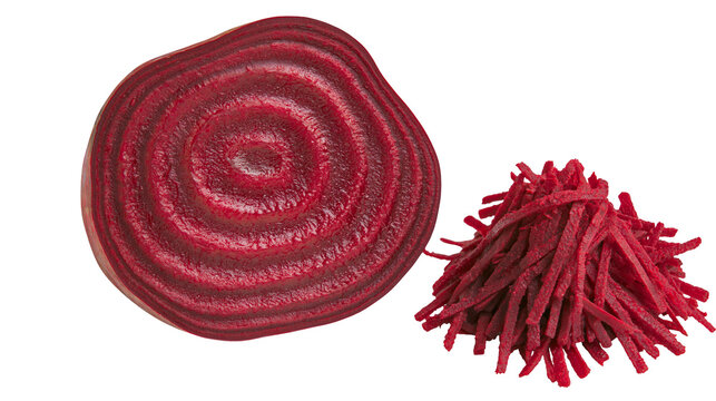 Beetroot slice with concentric rings and pile of shredded beetroot