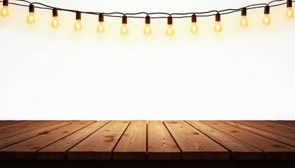 Obraz premium Empty wooden table surface with glowing string lights hanging above against white background. Rustic brown planks provide blank copy space for product display food presentation. Decorative festive