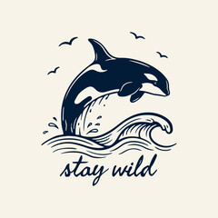 Naklejka premium Orca whale leaping over ocean waves with stay wild quote vector illustration. Vintage killer whale breaching ocean wave with birds and typography design. 