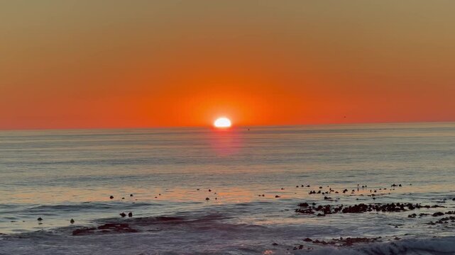 Red Sunset over an ocean near Cape Town, South Africa