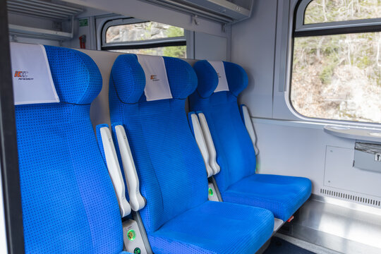 Szklarska Poreba, Poland - December 21, 2025: PKP Intercity train seats inside a modern railway passenger carriage, representing comfortable travel and efficient public transport