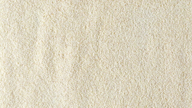 Wheat semolina uncooked organic background and texture