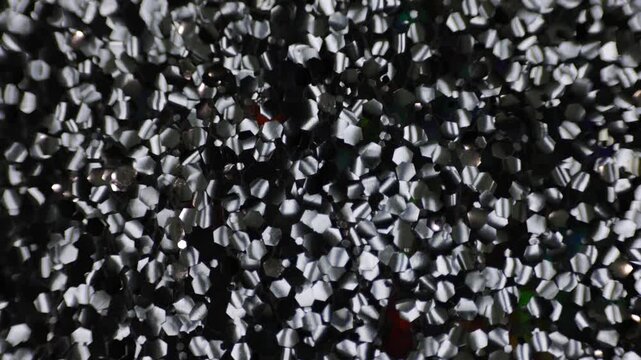 Shimmering silver sequins with moving light and rainbow bokeh for festive design, glam backdrop and luxury visuals