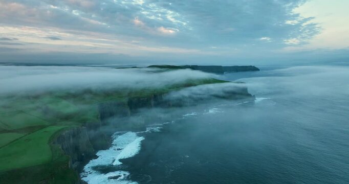Aerial View of Cliffs of Moher Shrouded in Fog at Sunrise, Ireland